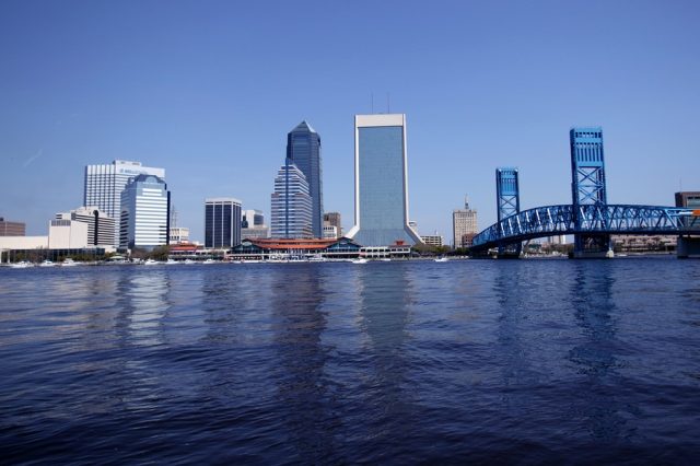bigstock Blue City Skyline Behind River 3514379